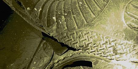 Photo of a foot entangled in a scraper conveyor