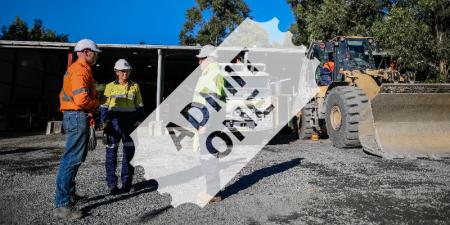 Image of three people wearing Hi-vis standing near a shed and machinery. Ticket overlaid reads 'admit one'.