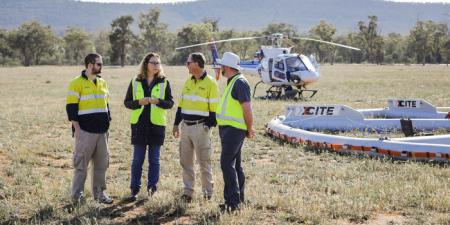 Photo showing geologists onsite during an aerial survey