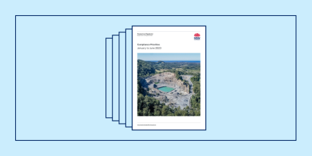White front page of a report titled 'Compliance Priorities' on a blue background.