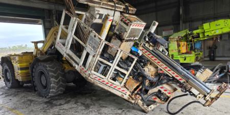 LHD with drill rig attachment